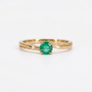 Anillo Solitario cruzado con esmeralda Oro 18k